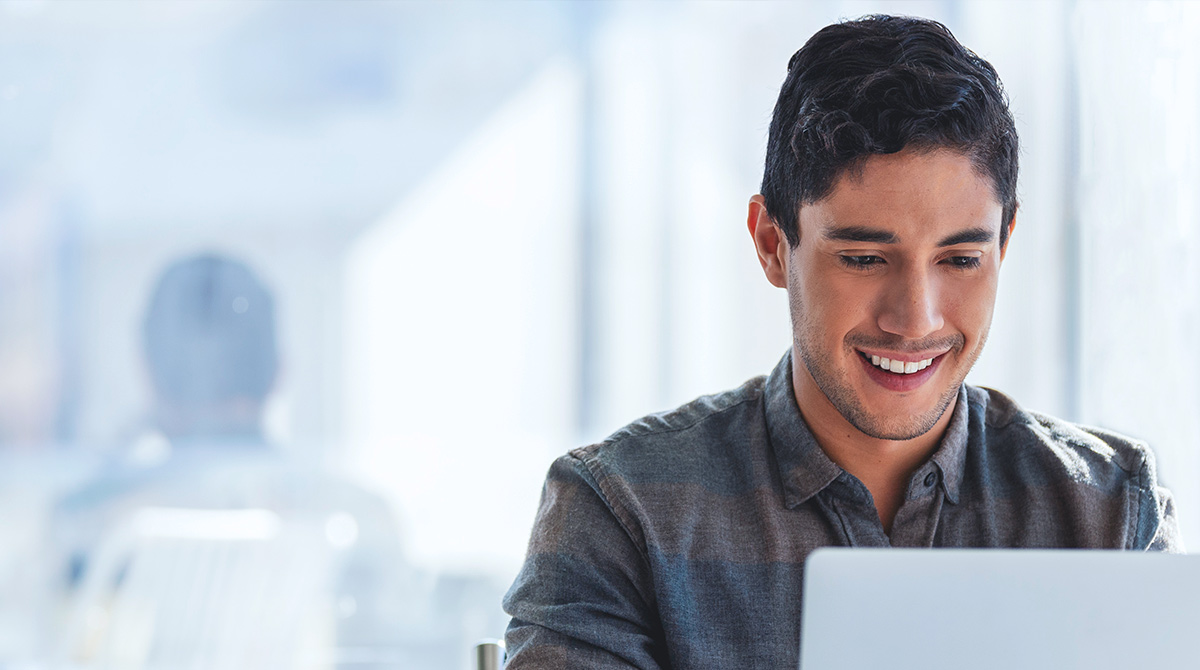 Man working at laptop in office