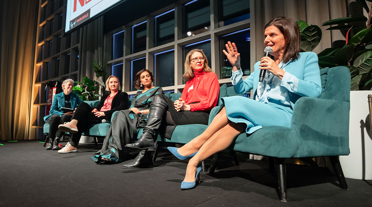 Women presenters on stage