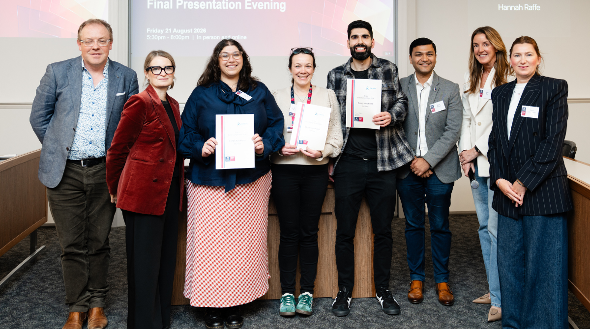 Winning team with the judges