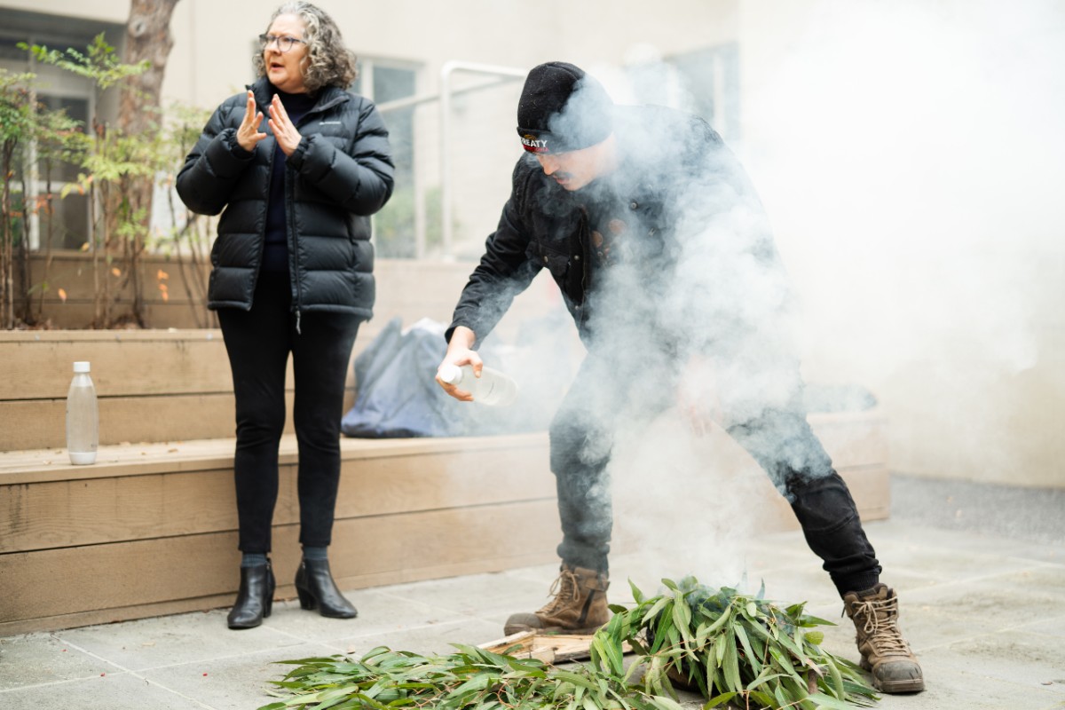 Thane Garvey from the Wurundjeri Tribe Council conducts a Smoking Ceremony at Melbourne Business School, 10 Aug 2022