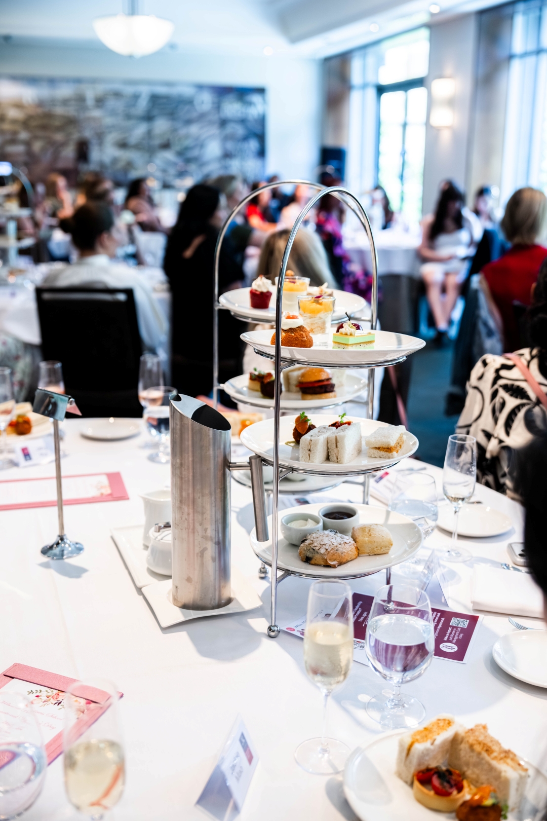 International Women's Day High Tea, 7 March 2026, The Westin Melbourne. Organised by Women’s Alumni Network President Claire Anglim (MBA 2023 and pictured, above) and committee members Caitlin Lynch (MBA 2021), Afsaneh Rashidi (MBA 2024) and Jennifer Mancuso (MBA 2023); to Women in Management Student Club President Fiona Sherwin and her team Mona Jhoty, Penny Bell, Jessica Maung and Jennifer Do. Panellists: Wendy Stops (Board Member, Coles and MBS), Elizabeth Wilson (CIO, Victorian Department of Education), Natasha Santha (Executive General Manager - Transformation, RACV), Associate Professor Jody Evans