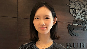 profile image of Susan Yang with Burberry logo in background